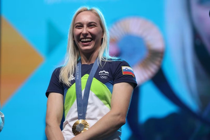 Janja Garnbret olimpijske igre zlata medalja kongresni trg sprejem