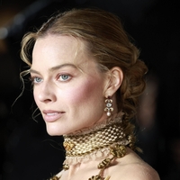 Margot Robbie je modna zmagovalka tedna: to so eni najboljših videzov v njeni karieri